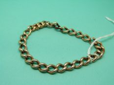 A 9ct gold curb link bracelet, 8.2g.