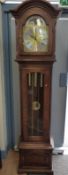 Richard Broad modern oak longcased clock with moon phase brass dial,