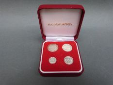 A cased set of four Maundy coins for 1936,