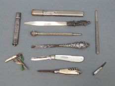 A quantity of folding knives including hallmarked silver and mother of pearl hallmarked example,