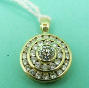 A Kutchinsky 18ct gold pendant set with a round brilliant cut diamond,