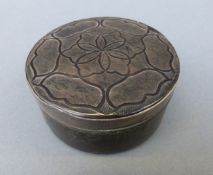 A 19thC carved horn snuff box with white metal collar,