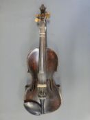 A 19thC violin in dark wood, labelled Degani Guilio de Eugenio, Fece in Venezia (Venice),