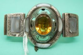 A Victorian Scottish silver bracelet set with banded agate and a large citrine,
