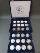 A collector's case containing twenty four various commemorative crowns, some thought to be silver,