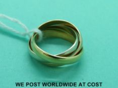 A Les Must de Cartier Russian tricolour wedding ring marked 750, weight 7.
