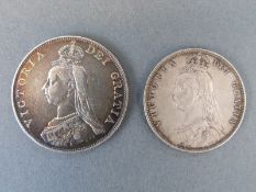 An 1887 Jubilee Queen Victoria double florin, together with a half crown of the same year,