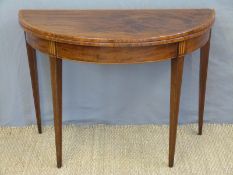 A Georgian mahogany demi-lune fold over card table,