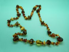 An amber necklace made up of opaque butterscotch beads,