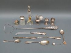 A quantity of hallmarked silver and other items to include a pair of hallmarked silver peppers,