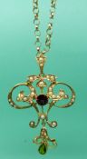 A 9ct gold Edwardian pendant set with a peridot,