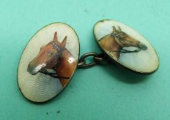 A silver cufflink set with guilloche enamel depicting horses