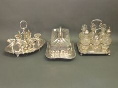 A six bottle plated cruet set,