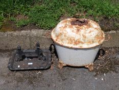 A coal bucket and cast iron foot scraper