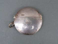 A Vickery hallmarked silver circular vesta, engraved to front with Baroness' coronet and name Eva,