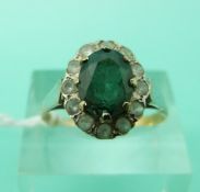 A 9ct gold ring set with paste (Size R)