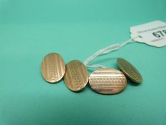 A pair of 9ct gold cufflinks with engine turned decoration, 11.4g.