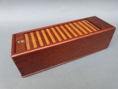 A tambour fronted wooden box,