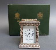 Charles Frodsham, London timepiece, carriage clock in silver case decorated with classical figures,
