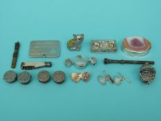 A silver stamp case, silver pen, silver pot with agate top, silver pot in the form of a sweet,