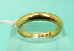 A 22ct gold wedding band, weight 6.