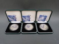 Three 2001 cased silver proof Britannia coins with certificates