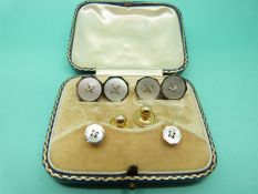 A pair of 18ct and 9ct gold cufflinks set with mother of pearl with two matching studs and a