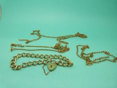 Three 9ct gold chains and a 9ct gold bracelet with heart padlock, 30.3g.