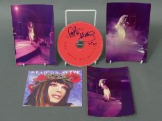 Signed Pete Burns CD together with three colour photos