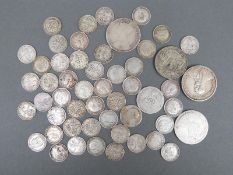 A quantity of silver coinage including forty five Victoria onwards three penny pieces,