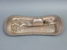 A 19thC Sheffield plate, wick trimmer and tray,