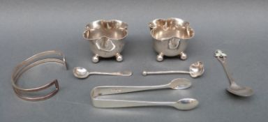 A pair of Edward VII hallmarked silver quatrefoil open salts, London 1905, two silver salt spoons,
