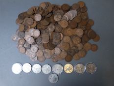 A collection of UK pre-decimal pennies together with a quantity of modern crowns