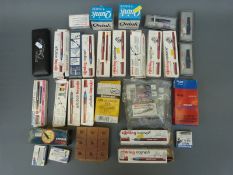 A collection of boxed pens, ink etc.