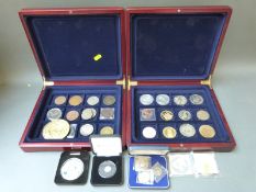 Two collectors coin trays containing medallions etc and a cased miniature gold coin,