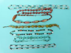 Seven agate beaded necklaces including carnelian agate,