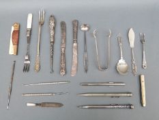 A hallmarked silver spoon and knife with pierced decoration, weight 20g,