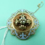 A Victorian mourning brooch set with blue enamel, seed pearls and a diamond,