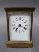 Early to mid 20th century French timepiece carriage clock in 'corniche' style brass case,