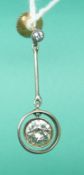 A Victorian earring set with an old English cut diamond of approximately 1ct on a drop section with