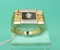 A yellow metal ring marked 585 set with a diamond, weight 8.