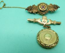 A Victorian 15ct gold brooch set with a ruby and diamonds,