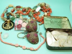 A coral necklace, agate example, coral bracelet, lucite brooch,