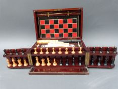 A late 19th/early 20thC games compendium, comprising chess, draughts, dice, backgammon,
