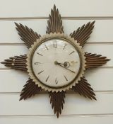 A Metamec circa 1960s sunburst wall timepiece,