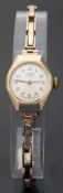 Vertex Revue 9ct gold ladies wristwatch with gold hands and Arabic numerals,