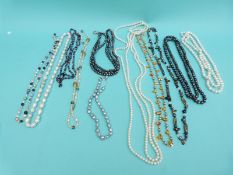 Eleven pearl necklaces including freshwater pearls in different colours,
