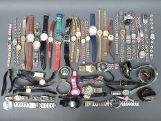Over 50 various ladies and gentleman's wristwatches.