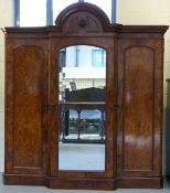 A 19thC breakfront burr walnut wardrobe or compactum,