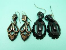 A pair of Victorian tortoiseshell earrings with gold inlay and a pair of jet earrings.